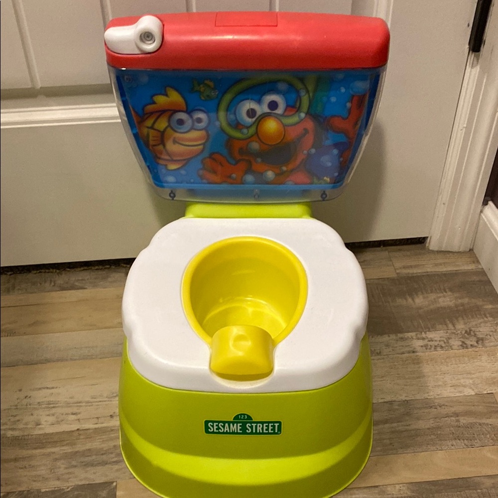 Sesame Street Kids Potty Trainer - Red, Yellow, White